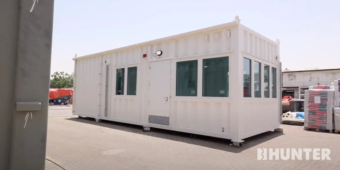 White custom modular guard house on construction site