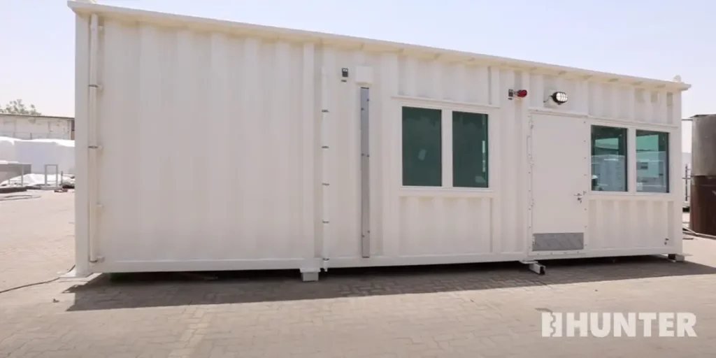 Rear view of white custom modular guard house
