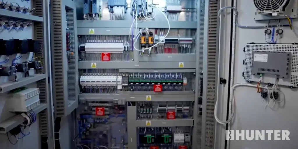 Electrical and system components inside a custom modular control room